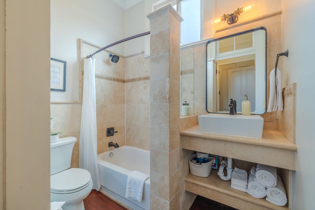Bathroom with a tub at 3223 Canal